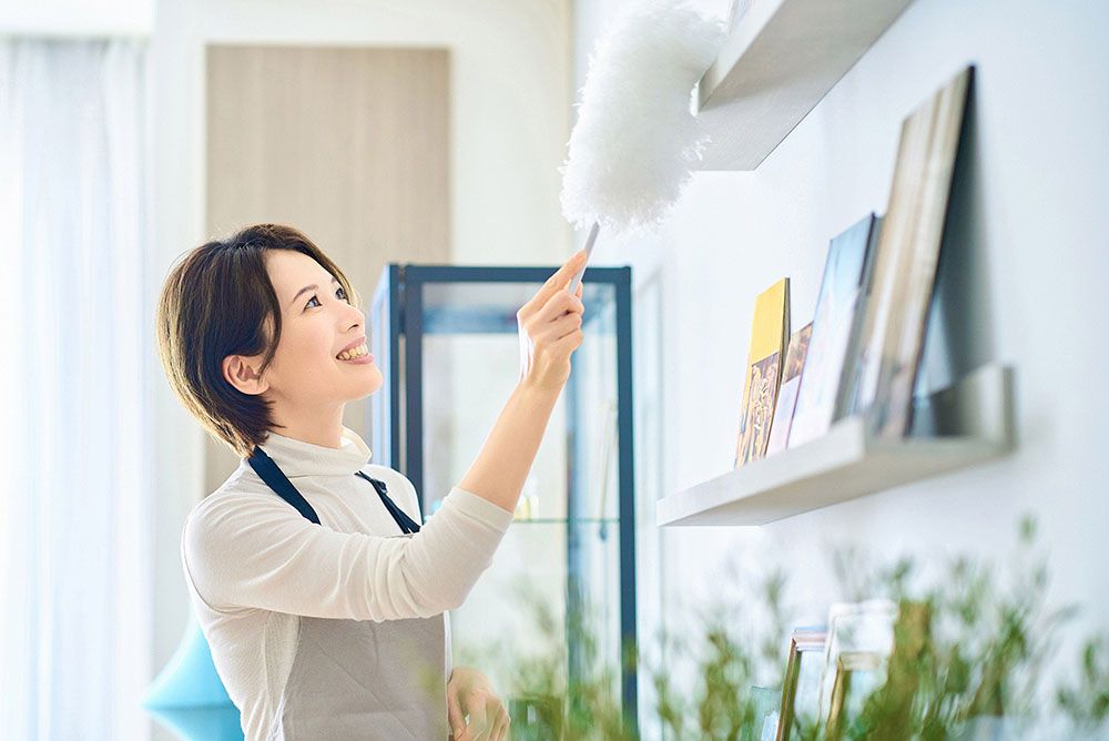 woman-cleaning-dust-from-every-corner-room.jpg